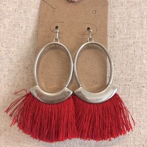 Red statement earrings